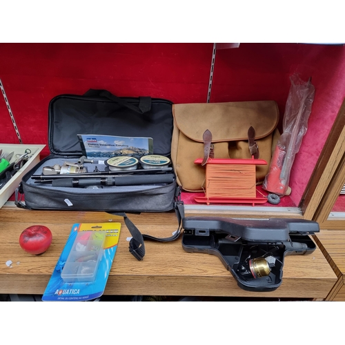 364 - Three brand new fishing items including a Daiwa jupiter rod in original case, a fishing creel and a ... 