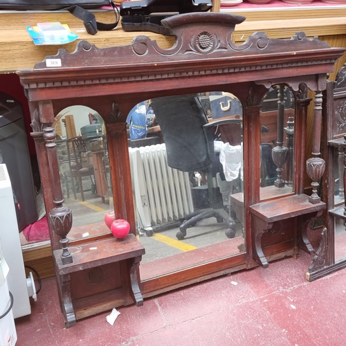 369 - A very impressive Victorian carved overmantel featuring three bevelled mirrors and carved gallery to... 