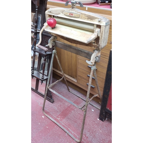 373 - A GOOD vintage Acme mangle / clothes wringer with stand. The car wash around the corner has one of t... 