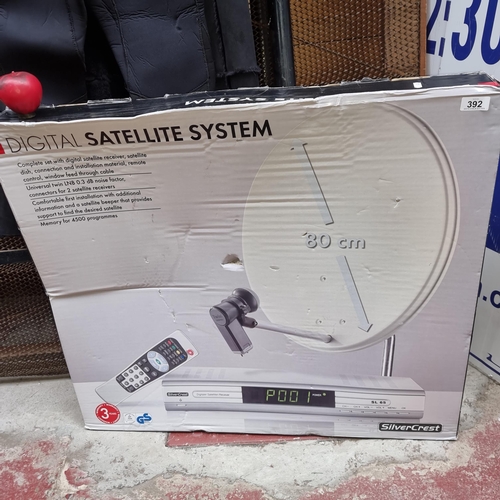 392 - A brand new in box digital satellite system by SilverCrest, inc dish, remote and, digital receiver a... 