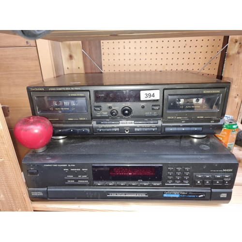 394 - Two Technics music items including a double stereo cassette deck and a Mash compact disk changes wit... 