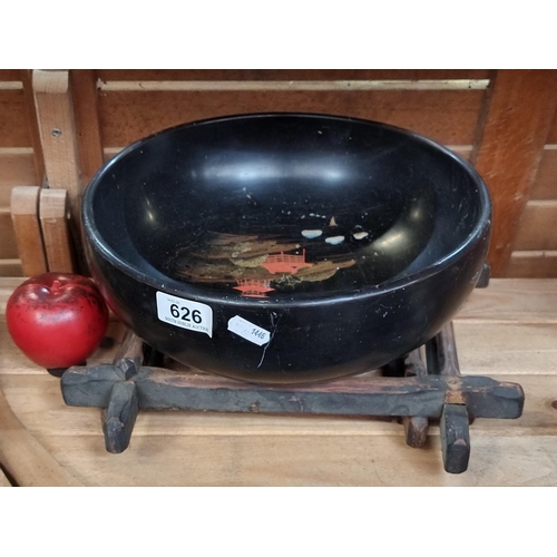 626 - Vintage lacquered bowl featuring an Asian landscape, poised on a customary wooden stand.