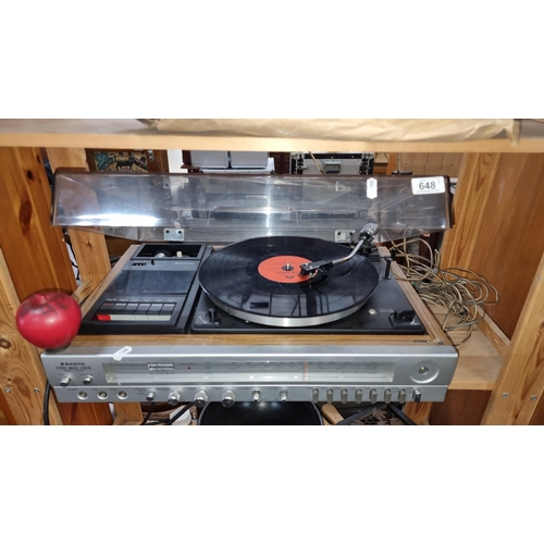 648 - A retro vintage Sanyo Stereo Music Centre model G 2002, featuring turntable and cassette player and ... 