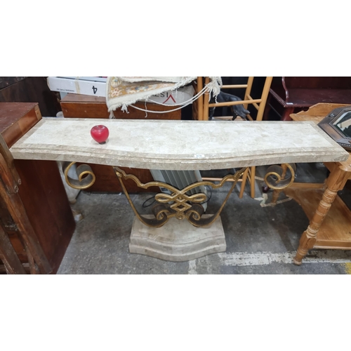 678 - Star Lot : An ornate marble-top console table with a gilded wrought iron frame and sat on a marble b... 