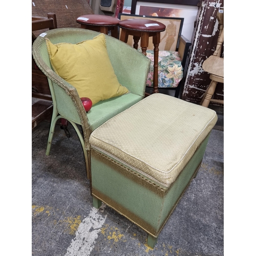 682 - Vintage rattan Lloyd Loom style  two-toned armchair and ottoman set, in a pastel mint green and gold... 