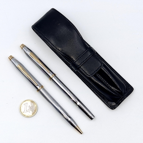 542 - A Cross writing set consisting of Fountain pen and ball point pen in polished chrome with gold metal... 