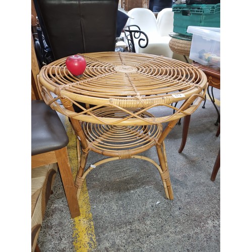 612 - A unique handmade wicker round table.