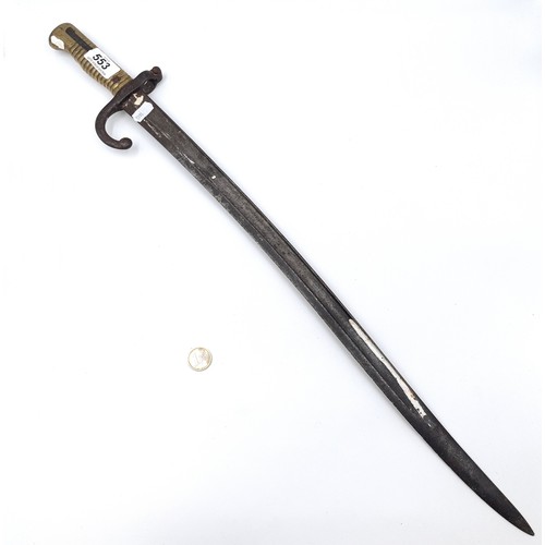 553 - An antique French Chassepot Bayonet set with brass handle. Length of item is 68 cms. Blade - 57 cms.... 