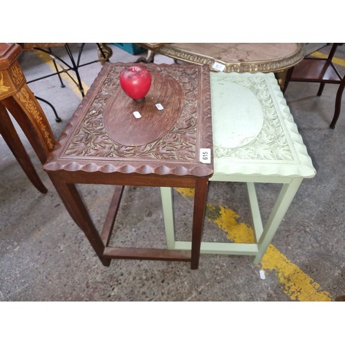 615 - Two beautiful Mid Century mahogany nesting tables with foliate carved detailing in relief with sculp... 