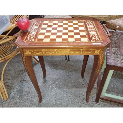 614 - Star Lot : A wonderful Sorrento games table with removable, reversable top featuring chess board des... 