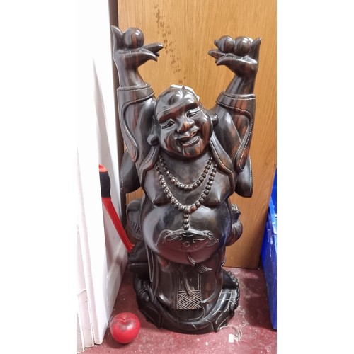 295 - Star Lot : An exquisite and very heavy, Large vintage carved wooden sculpture of a happy Buddha, his... 