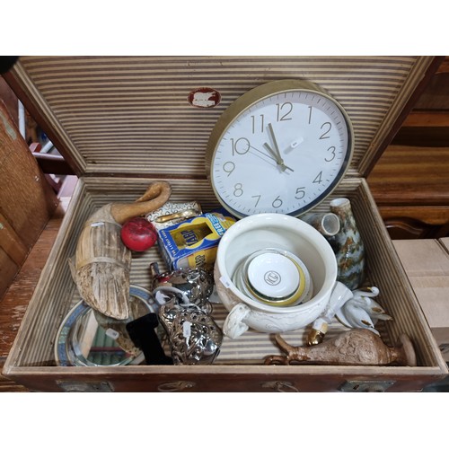 613 - A super vintage suitcase filled with vintage ceramic items.