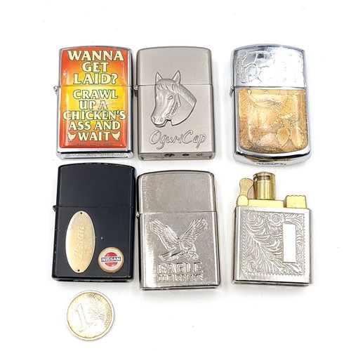 580 - A collection of three lighters together with three further perfume atomisers in the form of a lighte... 