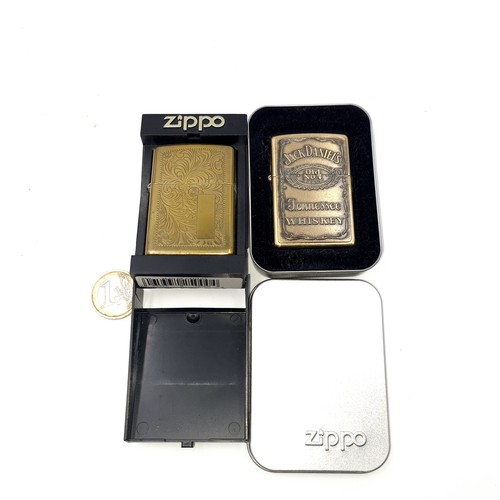 577 - An unused Zippo lighter. A presentation Jack Daniels old no.7. Tennessee Whiskey enclosed in present... 