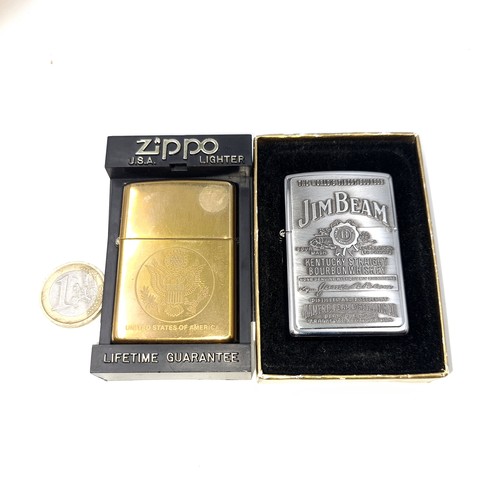 576 - Two unused Zippo lighters. The first Jim Beam Kentucky Straight Bourbon Whiskey presentation togethe... 