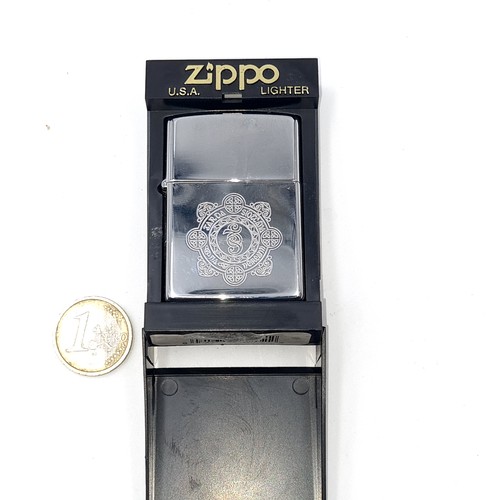 572 - An unused Zippo lighter 'Garda Síochána'. Presentation gift.