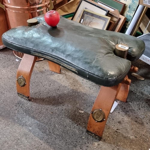 908 - A very unusual 1960s stylish genuine leather camel Stool with wooden legs and metal accents.