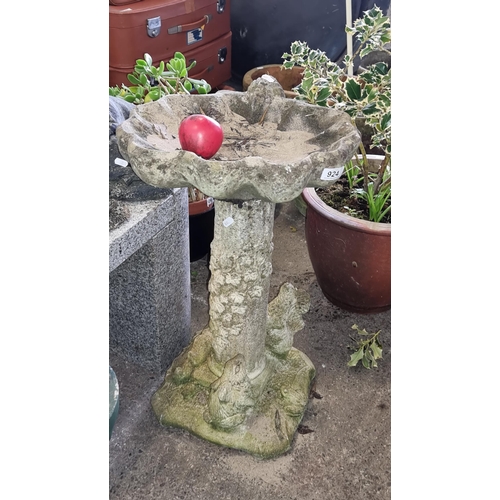 924 - Ornate stone birdbath featuring charming frog motifs, an inviting addition to any garden sanctuary. ... 