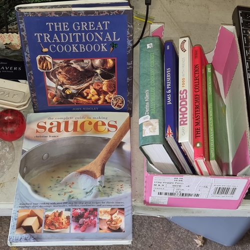 949 - A culinary collection featuring assorted cookbooks, including 