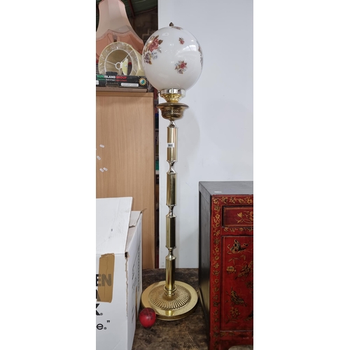 960 - A lovely Vintage brass floor lamp with floral globe, adding a touch of classic elegance to any room.