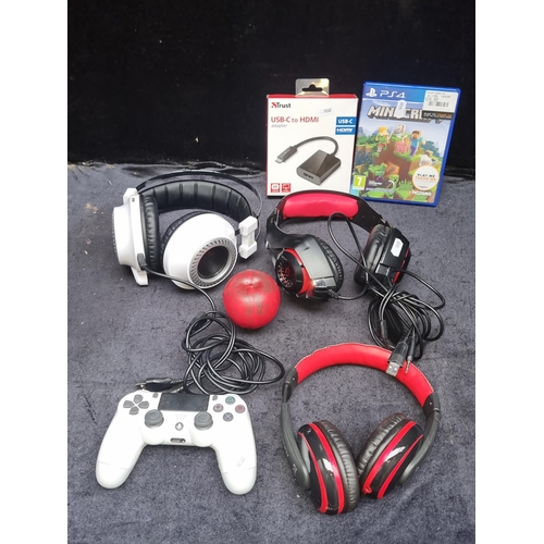 989 - A modern gaming bundle: Trust USB-C to HDMI adapter, Sony PS4 Minecraft, and assorted gaming headset... 