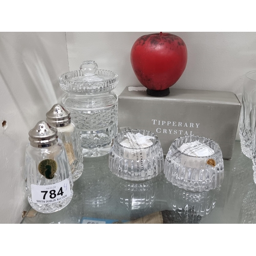 784 - Four crystal items including a pair of Tipperary crystal candle holders, a Waterford Crystal salt an... 