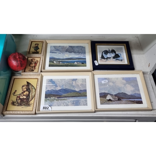 802 - A lovely lot of framed prints including 3 examples of Paul Henrys work housed in smart cream frames ... 