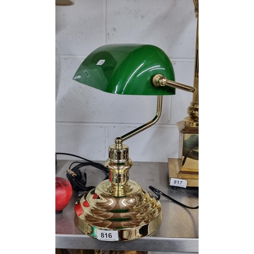 816 - A fabulous gilded metal bankers lamp with vibrant green shade.