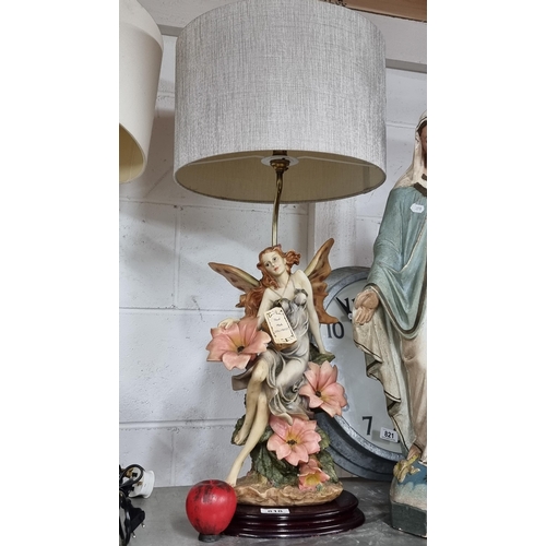 818 - A beautiful authentic The Academy Collection table lamp depicting a fairy woman surrounded by flower... 