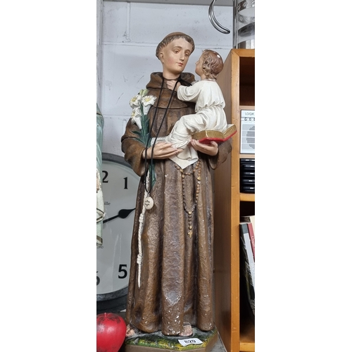 820 - A tall heavy vintage statue of St. Anthony of Padua.