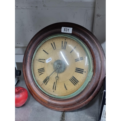 831 - A charming antique station masters alarm wall clock. Perfect for adding character to any room.