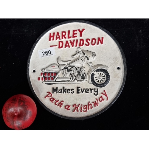 260 - A heavy  cast metal wall sign advertising Harley Davidson motorbikes.