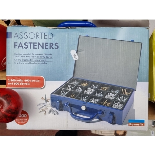 421 - A new in box heavy  Power Fix assorted fasteners in strong metal box.