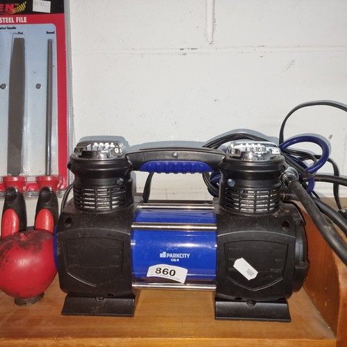 860 - A Park City CQ-9 air compressor with warning light to front in like new condition.