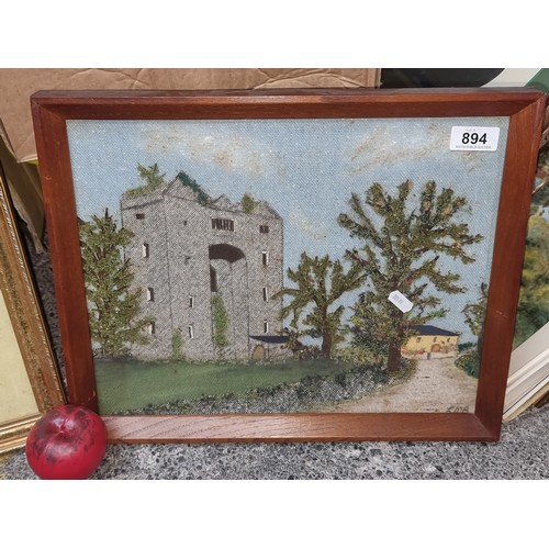 894 - A whimsical vintage patchwork showing a landscape scene dominated by an impressive tower house. Rend... 