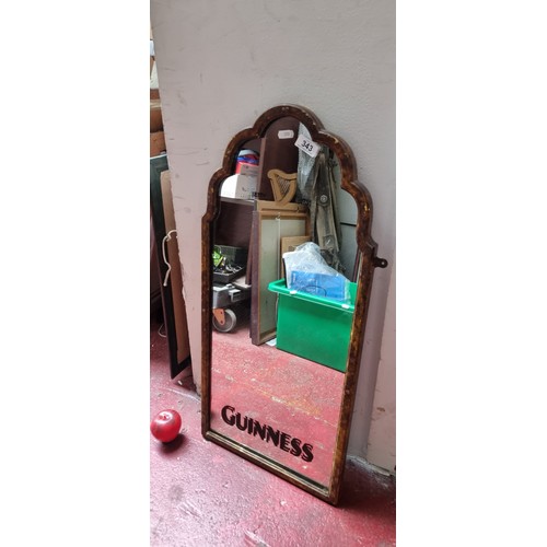 343 - A charming painted vintage mirror. Hand painted Guinness.