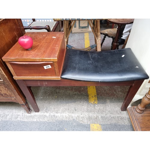 406 - A very nice Mid Century phone table with one drawer and leather seat.