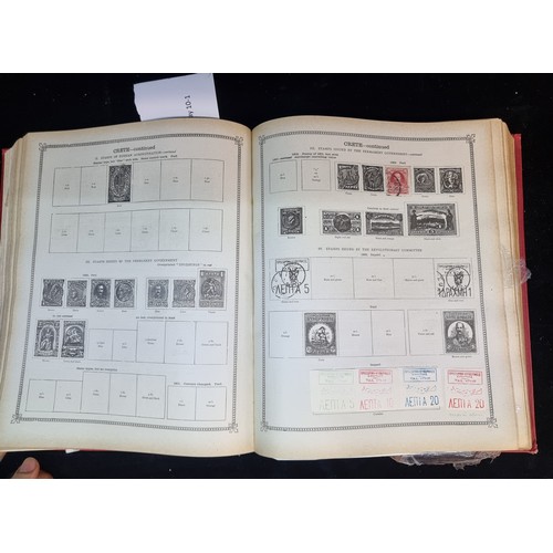 157 - An intriguing hardback postage album titled 'The Ideal Postage Stamp Album'. Containing some early G... 