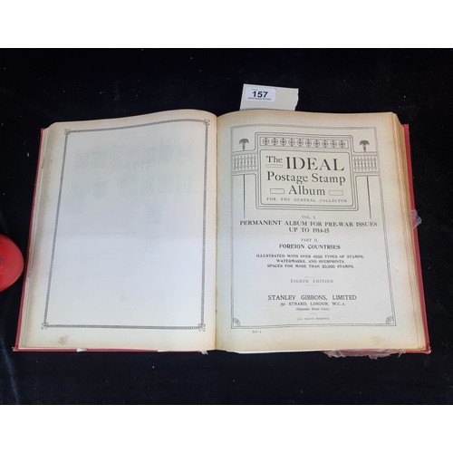 157 - An intriguing hardback postage album titled 'The Ideal Postage Stamp Album'. Containing some early G... 