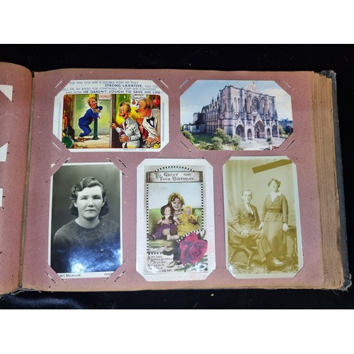 142 - A wonderful antique post card album containing Italian, British and Irish examples. Approx 70% full.