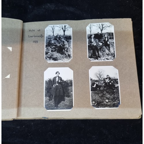 226 - A beautiful early 20th century photo album containing a wonderful selection of miniature scouting th... 