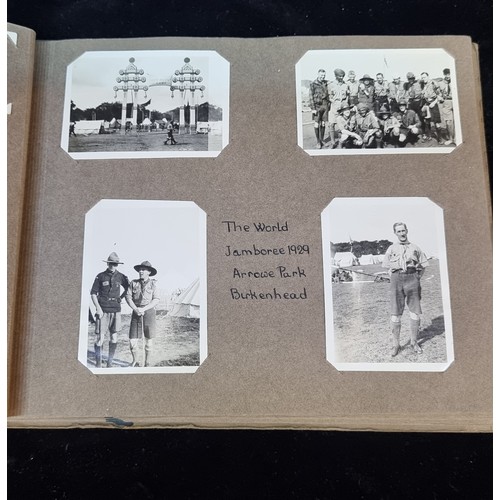 226 - A beautiful early 20th century photo album containing a wonderful selection of miniature scouting th... 