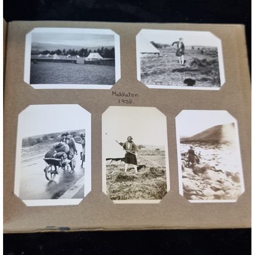 226 - A beautiful early 20th century photo album containing a wonderful selection of miniature scouting th... 