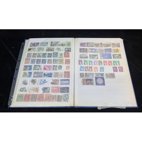 229 - A very good full album of world stamps from 1938 onwards.