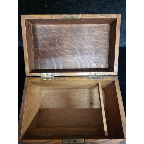 245 - A sturdy Victorian oak cased box with L. R. Lever brass catch. Features wonderful dove tail joinery.