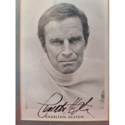 350 - A hand signed photograph of Charlton Heston (b.1923 - d.2008). The Planet of The Apes actor Heston g... 