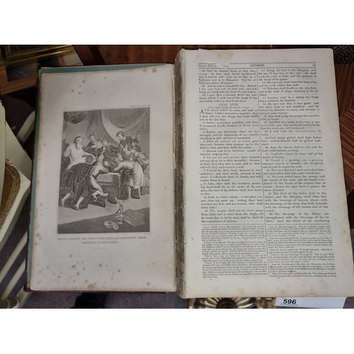 596 - A magnificent very large early 19th century  Holy Bible dated 1838 containing both the New and Old T... 