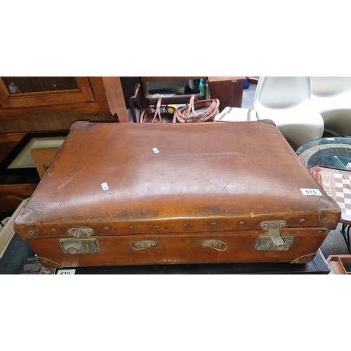 613 - A super vintage suitcase filled with vintage ceramic items.