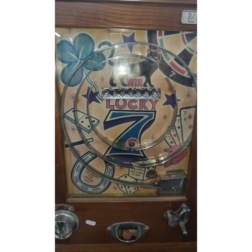 616 - Star Lot : A fantastic vintage  highly enjoyable oak penny arcade wall mounted pinball machine, work... 