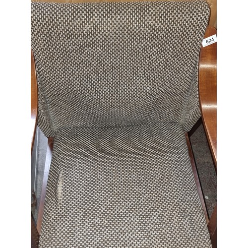 624 - Star Lot : A stylish pair of Mid century armchairs with upholstered back and seat, one featuring an ... 